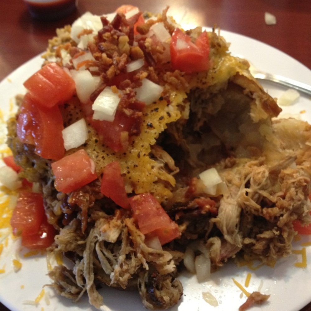 Red House BBQ - BBQ Baked Potato - stuffed with pulled pork, tomatoes and onions, topped with BBQ toasted cheese - TO DIE FOR! - Barbeque Near Me - Tehachapi, California Red House BBQ - BBQ Baked Potato - stuffed with pulled pork, tomatoes and onions, topped with BBQ toasted cheese - TO DIE FOR! - Barbeque Near Me - Tehachapi, California