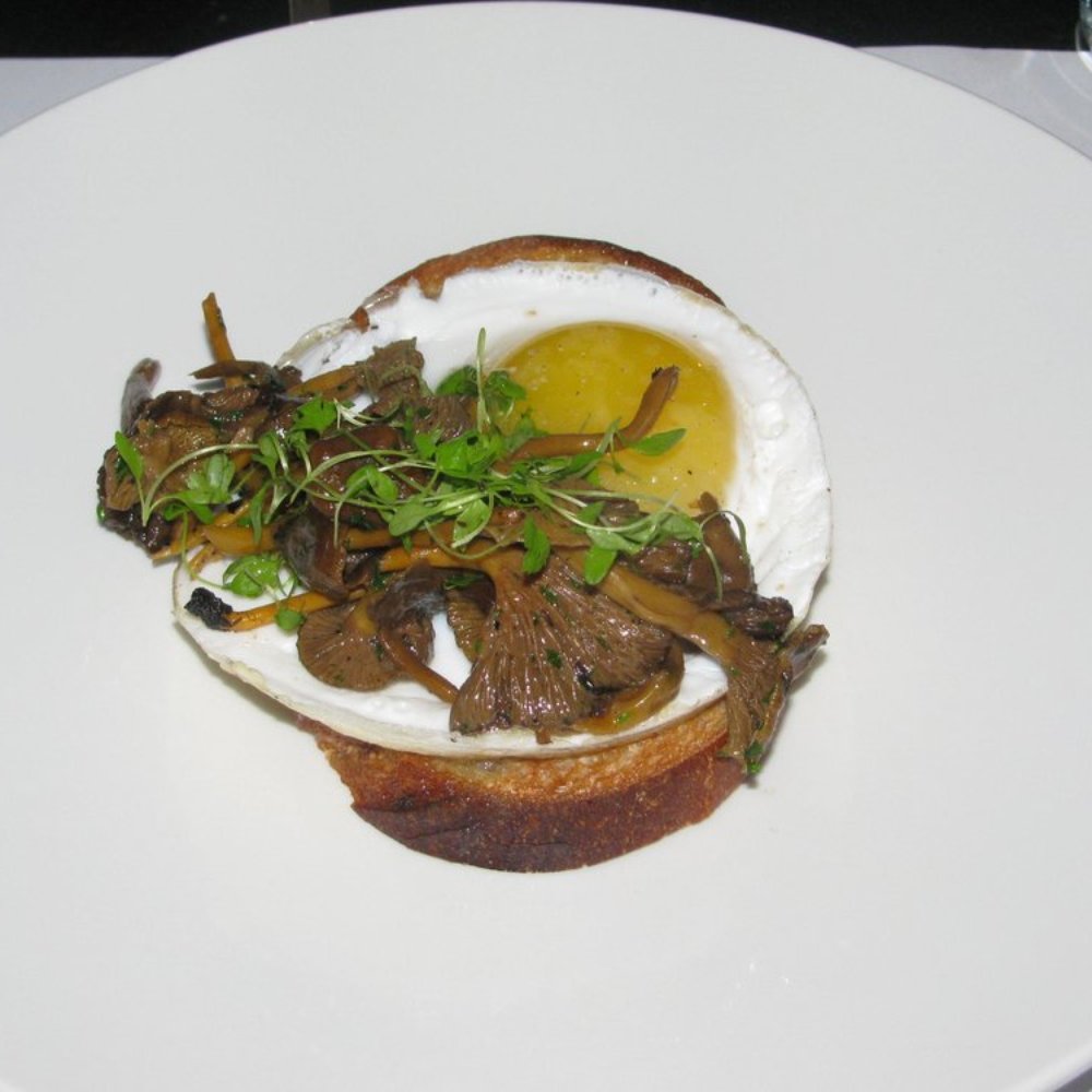 I think this was a duck egg on toast with mushrooms.  It was delicious.