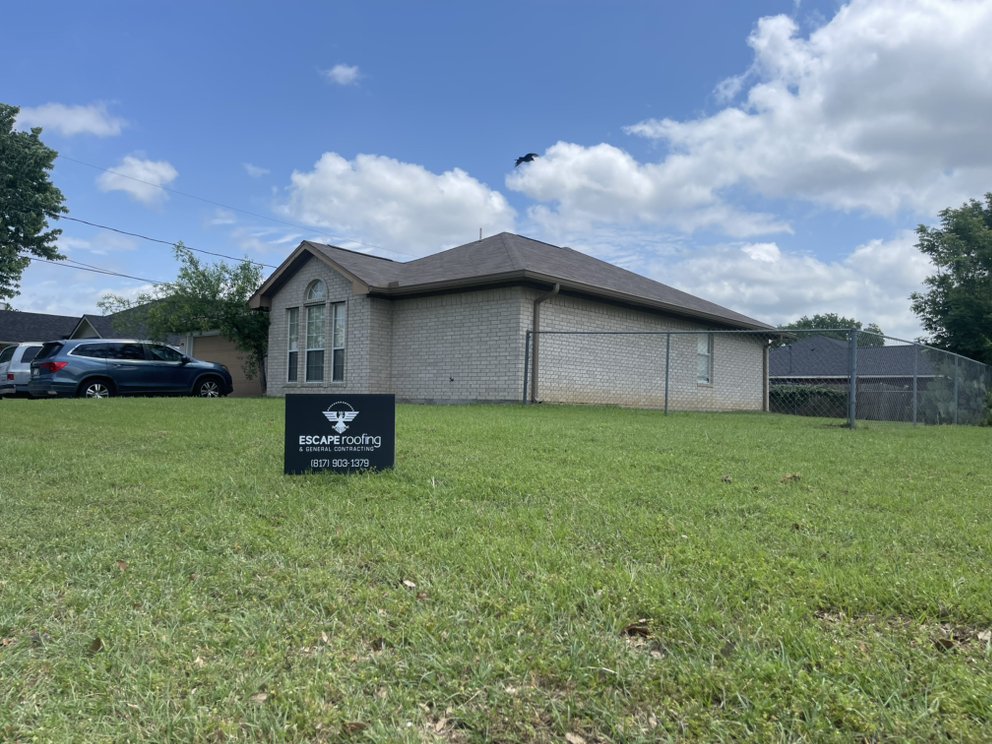 Slide of Escape Roofing