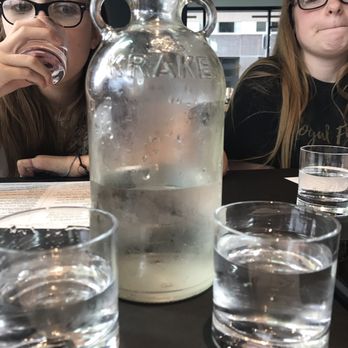 Stack 571 Burger and Whiskey Bar - Very cool water pitcher- empty glass alcohol bottles - American Near Me - Vancouver, Washington Stack 571 Burger and Whiskey Bar - Very cool water pitcher- empty glass alcohol bottles - American Near Me - Vancouver, Washington