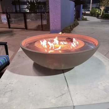 Hotel Indigo Gainesville-Celebration Pointe - Fire pit in the courtyard - Hotels Near Me - Gainesville, Florida Hotel Indigo Gainesville-Celebration Pointe - Fire pit in the courtyard - Hotels Near Me - Gainesville, Florida