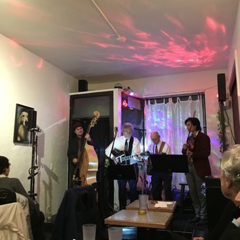La Copa Cafe - a group of people playing music - Coffee & Tea Near Me - Seattle, Washington