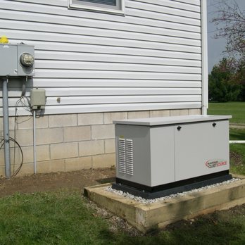 Higher Power Electric - 2006 - 16KW Generac Generator installation elevated on elevated base (landscape timbers & gravel) - Electricians Near Me - Pataskala, Ohio Higher Power Electric - 2006 - 16KW Generac Generator installation elevated on elevated base (landscape timbers & gravel) - Electricians Near Me - Pataskala, Ohio