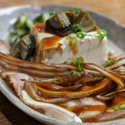 Preserved egg and tofu, cucumber, and pig ear