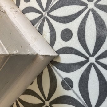 Romanoff Renovations - Trim does not align - Flooring Near Me