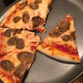 Elizabeth's Pizza - three slices of pizza on a pan - Pizza Near Me - Reidsville, North Carolina Elizabeth's Pizza - three slices of pizza on a pan - Pizza Near Me - Reidsville, North Carolina