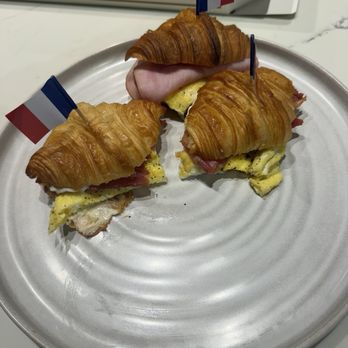 Vanilla Espresso French Café - Ham and cheese, bacon and mayo mini croissants that I took home and added a fried egg on. - Themed Cafes Near Me - Miramar, Florida Vanilla Espresso French Café - Ham and cheese, bacon and mayo mini croissants that I took home and added a fried egg on. - Themed Cafes Near Me - Miramar, Florida