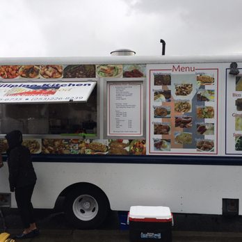 Filipino Kitchen - people ordering food from a food truck - Food Trucks Near Me Filipino Kitchen - people ordering food from a food truck - Food Trucks Near Me