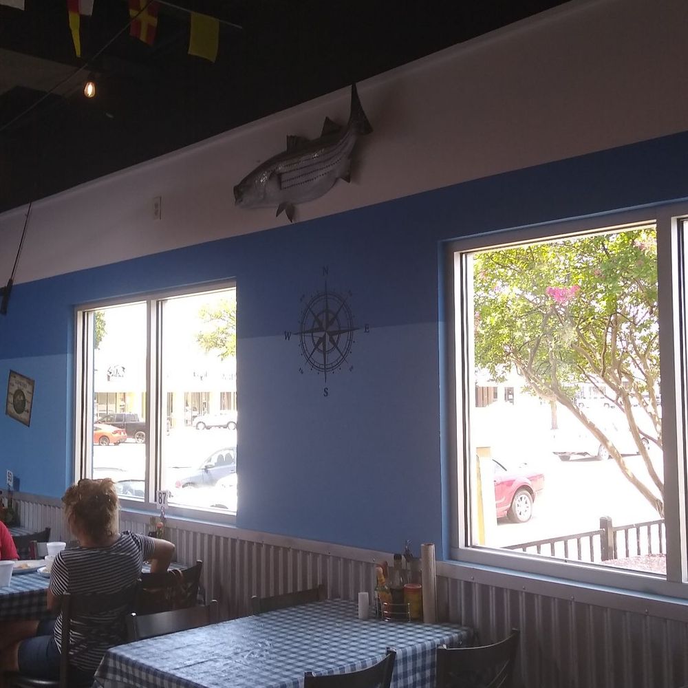 The Catch - Arlington  - Check out the Compass on the wall and the beautiful windows that create the right amount of light. - Seafood Near Me - Arlington, Texas