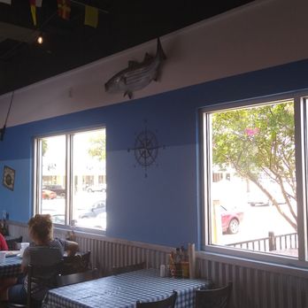 The Catch - Arlington  - Check out the Compass on the wall and the beautiful windows that create the right amount of light. - Seafood Near Me - Arlington, Texas