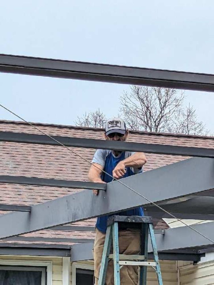 Slide of Moore's Roofing