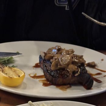 The Standard Restaurant - New York Strip Steak with onion and mushrooms - American Near Me - Toledo, Ohio The Standard Restaurant - New York Strip Steak with onion and mushrooms - American Near Me - Toledo, Ohio
