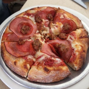 The Upper Crust Pizza - The meat lovers type pizza. - Pizza Near Me - Bishop, California