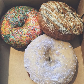 Uncle Dood's Donuts - laven (orange icing w/lavender sugar), twixed (choc, nilla wafer crumbles, & caramel), & tie dye (vanilla & multicolored sugar). - Donuts Near Me - Toms River, New Jersey