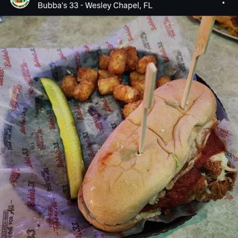 Bubba's 33 - Chicken Parmesan Sub where Chicken doesn't fit bread and Tater Tots served are pathetic in portion size - American Near Me - Wesley Chapel, Florida