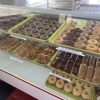 Donut Crossing - a variety of donuts in a display case - Donuts Near Me - Broken Bow, Oklahoma Donut Crossing - a variety of donuts in a display case - Donuts Near Me - Broken Bow, Oklahoma
