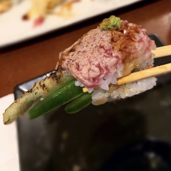 Fuji Sushi - Toro Peno roll - asparagus tempura, cream cheese and jalapeno inside and topped with seared toro - Sushi Bars Near Me - Seattle, Washington