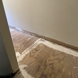 Paragon Residential Management - Ripped up floor. Workers haven't been back in three weeks.