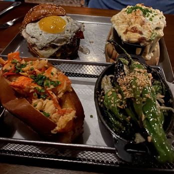 Gretel - Top: Burger + egg & bacon, and Mac & Cheese Bottom: Lobster Roll and Blistered Shishito Peppers - Cocktail Bars Near Me - Chicago, Illinois