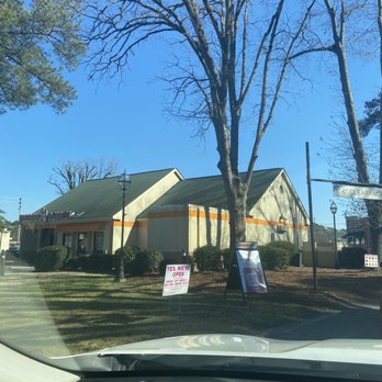 Dunkin' - a house with a for sale sign in front of it - Donuts Near Me - Wilson, North Carolina Dunkin' - a house with a for sale sign in front of it - Donuts Near Me - Wilson, North Carolina