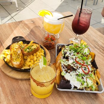 Deck 12 - Caribbean Nachos and Mac and Cheese Drinks: Betty the Yeti, Gettin Tiki with it and Fire and Sun - Cocktail Bars Near Me - Boston, Massachusetts Deck 12 - Caribbean Nachos and Mac and Cheese Drinks: Betty the Yeti, Gettin Tiki with it and Fire and Sun - Cocktail Bars Near Me - Boston, Massachusetts
