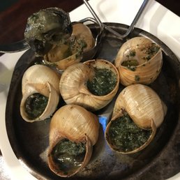 Fresh, garlicky escargots at the market. Fresh, garlicky escargots at the market.