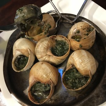 Les Halles de Lyon - Paul Bocuse - Fresh, garlicky escargots at the market. - Public Markets Near Me - Lyon, 69 Les Halles de Lyon - Paul Bocuse - Fresh, garlicky escargots at the market. - Public Markets Near Me - Lyon, 69