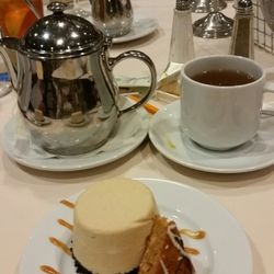 The Dinner Detective - Chocolate peanut butter pie and a cookie plus hot tea.