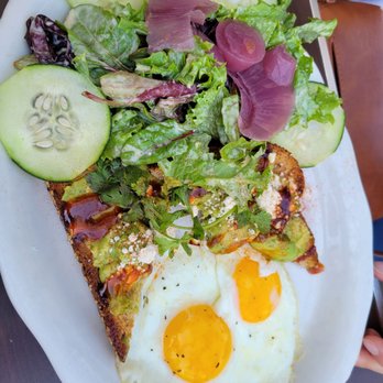 Tupelo Honey Southern Kitchen & Bar - Avocado toast with eggs - Southern Near Me - Denver, Colorado Tupelo Honey Southern Kitchen & Bar - Avocado toast with eggs - Southern Near Me - Denver, Colorado
