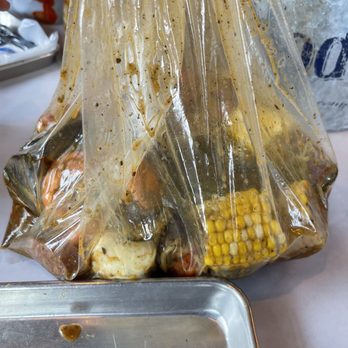 Mr Crab Seafood Boils - Bag of scallops, mussels, corn, prawns, and noodles - Seafood Near Me - Sparks, Nevada Mr Crab Seafood Boils - Bag of scallops, mussels, corn, prawns, and noodles - Seafood Near Me - Sparks, Nevada