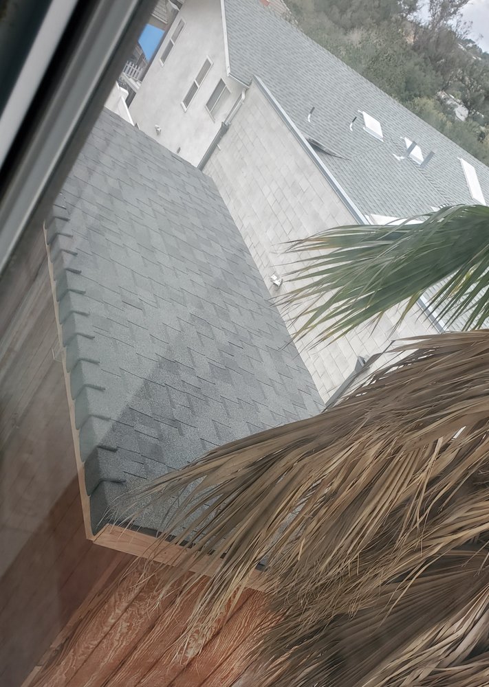 Slide of Outlaw Roofing