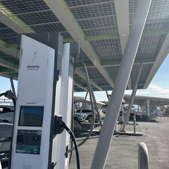 Electrify America - 12 charging stations and a lot of Tesla charging stations next to it. - EV Charging Stations Near Me - Baker, California Electrify America - 12 charging stations and a lot of Tesla charging stations next to it. - EV Charging Stations Near Me - Baker, California