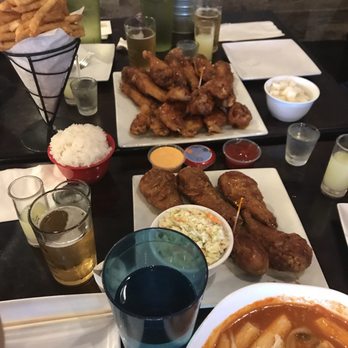 Bonchon San Jose - Blossom Hill Rd - soy garlic sauce drumstick, half order garlic soy sauce and hot sauce wings, fries and tteokbokki (rice cake) - Chicken Wings Near Me - San Jose, California Bonchon San Jose - Blossom Hill Rd - soy garlic sauce drumstick, half order garlic soy sauce and hot sauce wings, fries and tteokbokki (rice cake) - Chicken Wings Near Me - San Jose, California