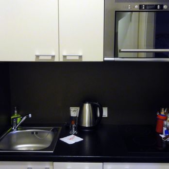 sleephotels Boardinghouse - Appartement Sleephotel Kochecke mit Kühlschrank - Hotels Near Me - Hamburg, HH