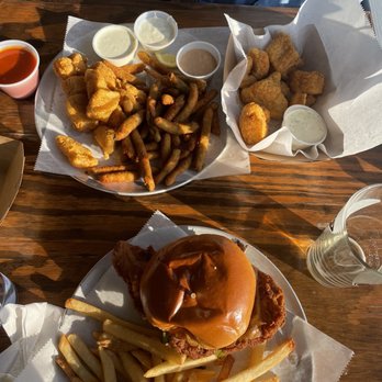 Germantown Pub - Catfish Nuggets and Fries with lemon pepper season and a Hot Chicken Sandwich with fries add cheese - Pubs Near Me - Nashville, Tennessee Germantown Pub - Catfish Nuggets and Fries with lemon pepper season and a Hot Chicken Sandwich with fries add cheese - Pubs Near Me - Nashville, Tennessee
