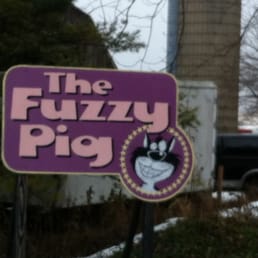 Their sign outside.  Apparently THE FUZY CAT was a name of one of their beloved cats.