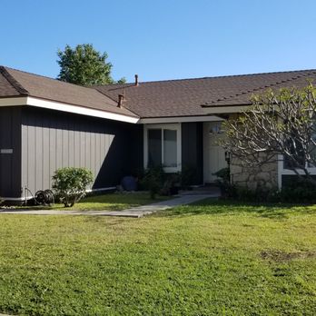 Sea Breeze Landscaping Construction - Before: Small walkway, terrible "grass," dilapidated fence on right - Landscaping Near Me - Orange, California
