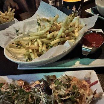 The Woolworth - Crab nachos and truffle fries - Cocktail Bars Near Me - Dallas, Texas The Woolworth - Crab nachos and truffle fries - Cocktail Bars Near Me - Dallas, Texas