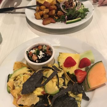 Hungry's - Migas and crab Benedict. - New American Near Me - Houston, Texas Hungry's - Migas and crab Benedict. - New American Near Me - Houston, Texas