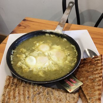 Pantry Foods - Shakahouka with green jalapeño and tomato sauce (3 eggs) & flatbread for extra $1 - Cafes Near Me - Toronto, Ontario Pantry Foods - Shakahouka with green jalapeño and tomato sauce (3 eggs) & flatbread for extra $1 - Cafes Near Me - Toronto, Ontario
