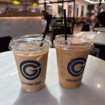 Common Good - pistachio vanilla latte with whole milk (left), golden hour latte (oat milk) - Hair Salons Near Me - Dallas, Texas Common Good - pistachio vanilla latte with whole milk (left), golden hour latte (oat milk) - Hair Salons Near Me - Dallas, Texas