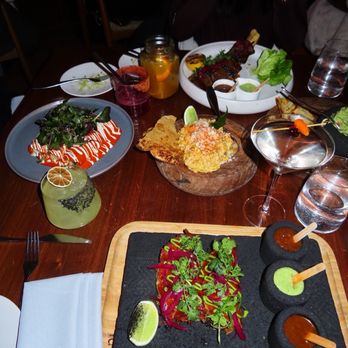 Tan - Shrimp & Lobster Enchiladas Quesabirria Esquites Short Rib al Carbon Big Orange Martini Margarita Jungle - Latin American Near Me - New York, New York Tan - Shrimp & Lobster Enchiladas Quesabirria Esquites Short Rib al Carbon Big Orange Martini Margarita Jungle - Latin American Near Me - New York, New York