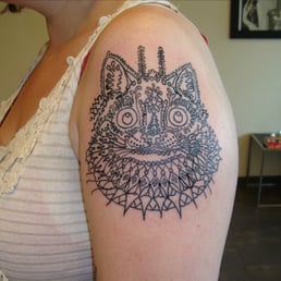 Friend of mine Kristina's tattoo! Louis Wain spirographic cat. Friend of mine Kristina's tattoo! Louis Wain spirographic cat.