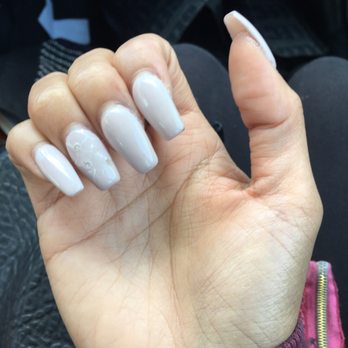 Nails 4 U & Spa - You can see the ugly empty pits where the diamonds fell off after a few days. - Nail Salons Near Me - Fullerton, California