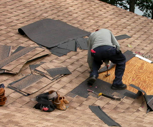 Slide of Leslies Roofing