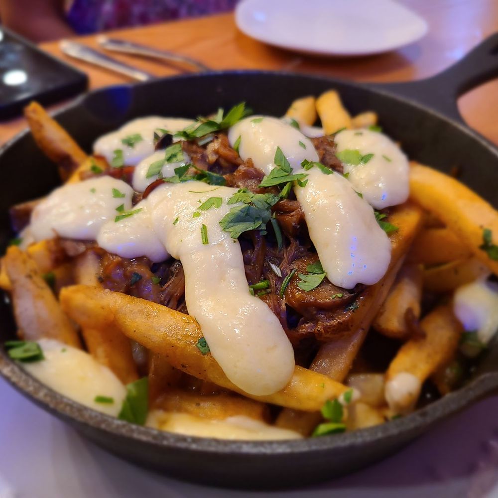 Sally O's - Duck Confit Poutine - Bars Near Me - Baltimore, Maryland Sally O's - Duck Confit Poutine - Bars Near Me - Baltimore, Maryland