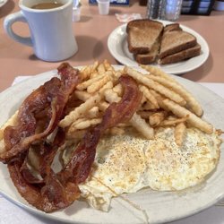 Yankee Kitchen Restaurant - 2 eggs, crinkle cuts, grilled bacon, and wheat toast