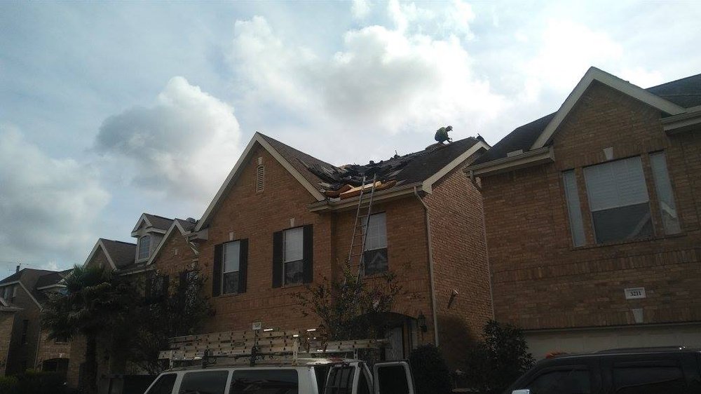 Slide of Trademark Roofing & Construction