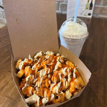 Meltwich Food - a box of fries and a drink - Sandwiches Near Me - Calgary, Alberta Meltwich Food - a box of fries and a drink - Sandwiches Near Me - Calgary, Alberta