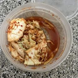AZN Bowls. Bao. Juice Bar - Extra side of kimchee (partially eaten)